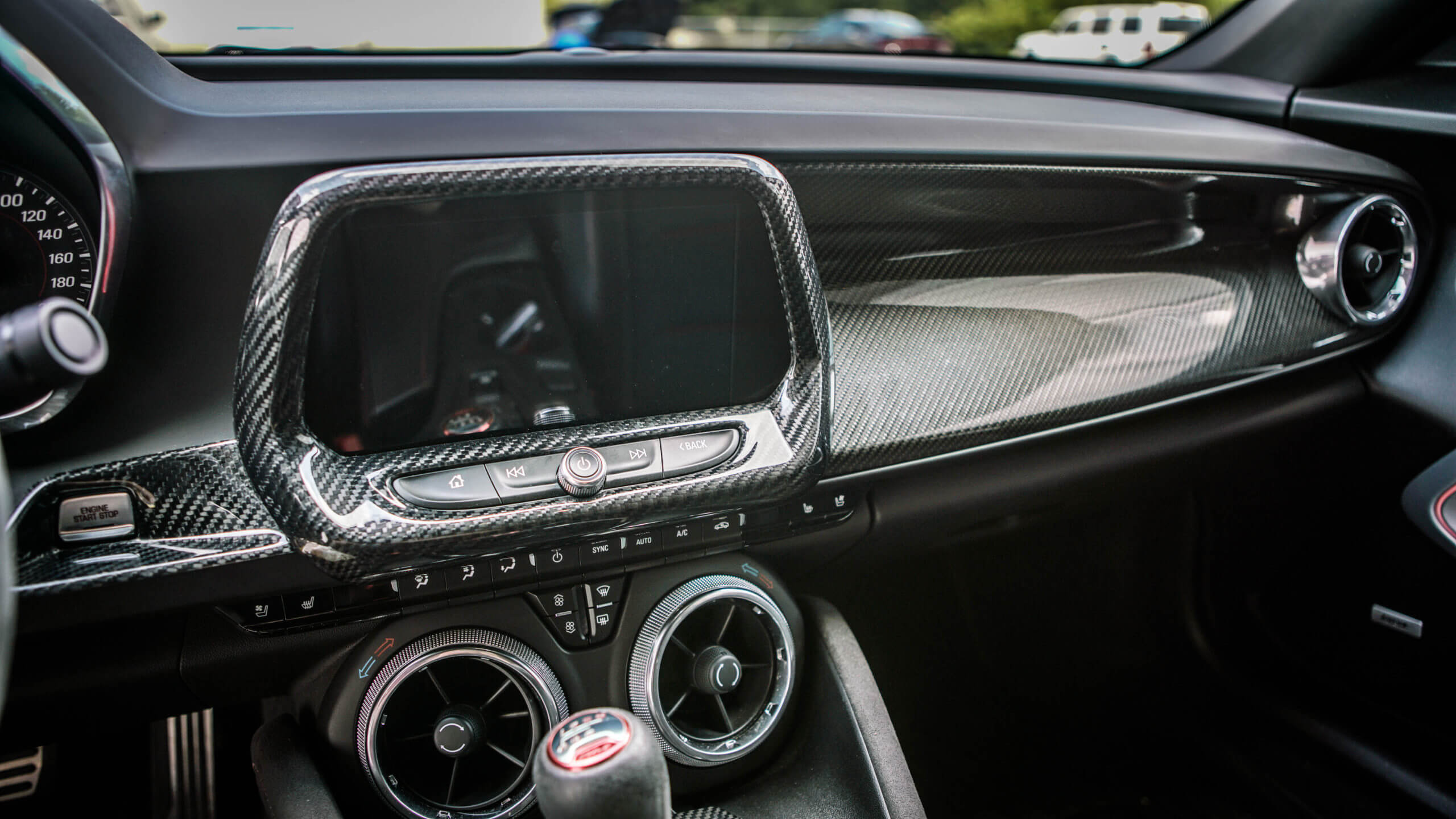 2016-2019 Camaro Carbon Fiber LG362 Radio Bezel Cover - EXCLUSIVE